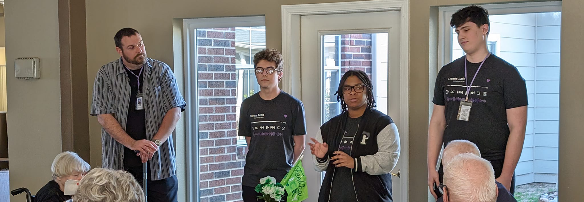 Students host a cyber safety workshop for residents of a local assisted living center
