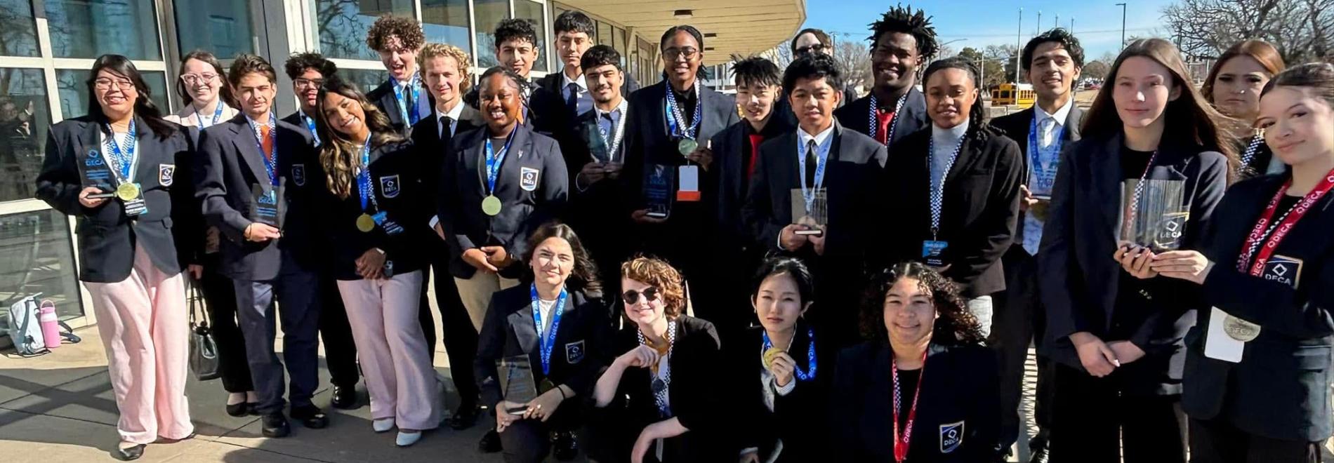 Students pose for a group photo after the 2026 Oklahoma DECA State Career Development Conference