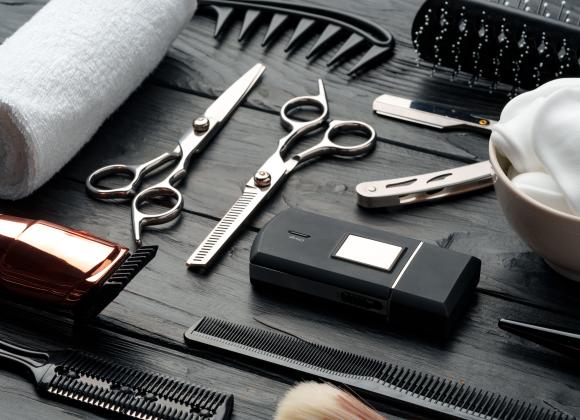 Barbering tools on a wood table