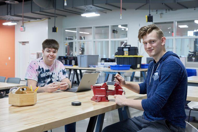 two students working on projects in the danforth product realization lab