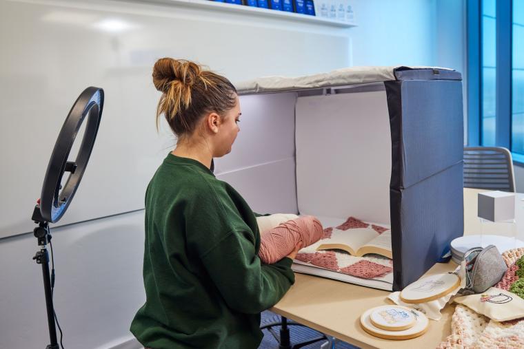 Student putting together product display
