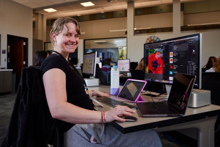 Student working on a project in photoshop