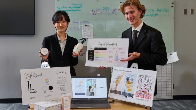 Two students doing a presentation of a product