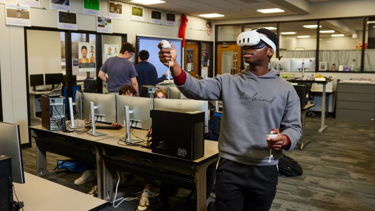 Student wearing VR headset