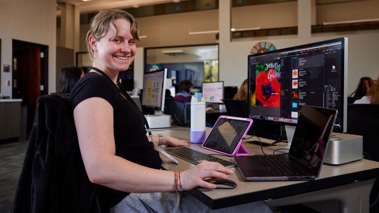 Student working on a project in photoshop