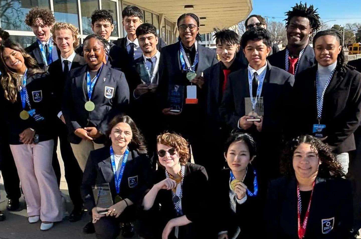Students pose for a group photo after the 2026 Oklahoma DECA State Career Development Conference