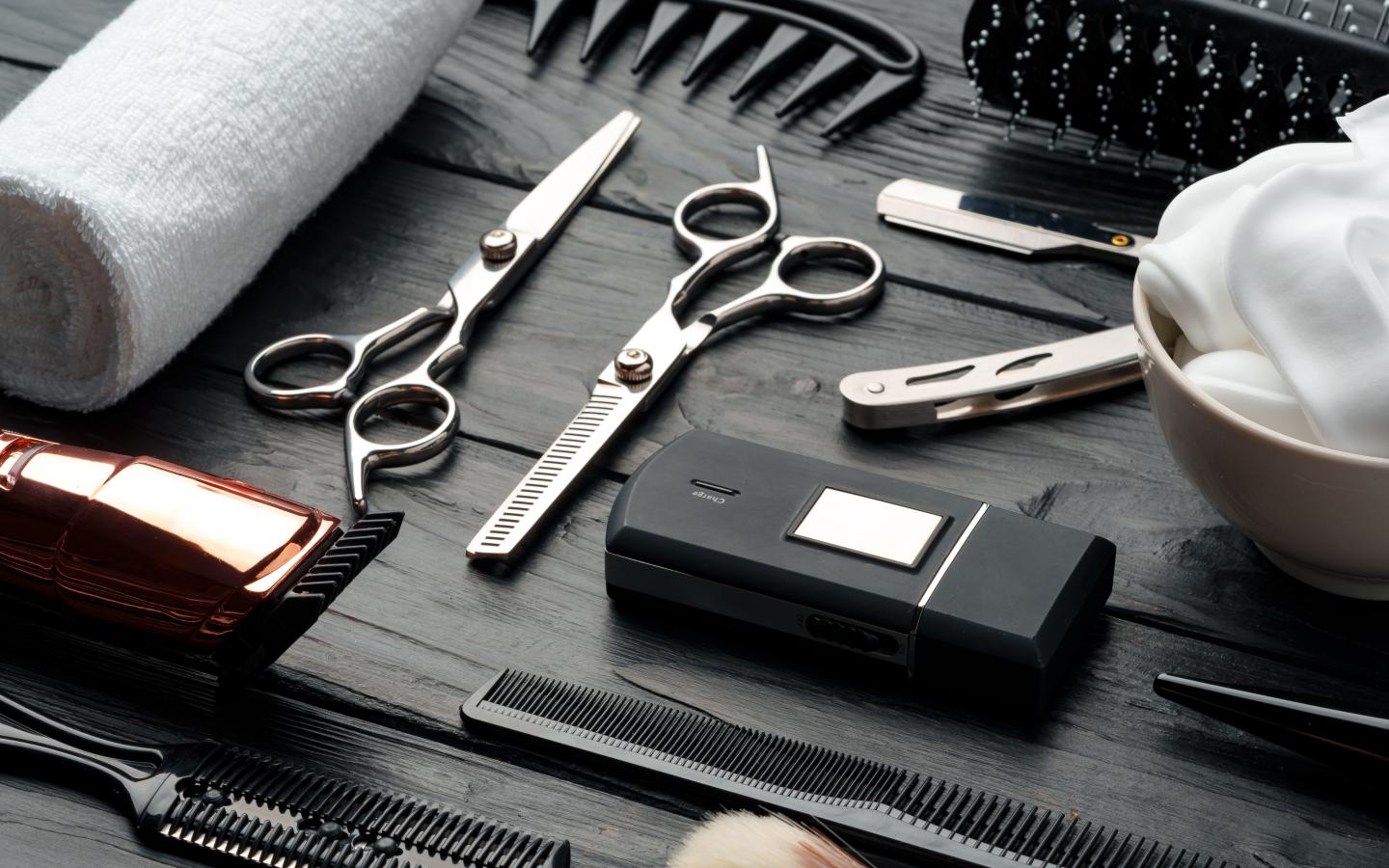 Barbering tools on a wood table