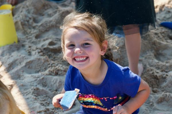 Child playing in a sandbox