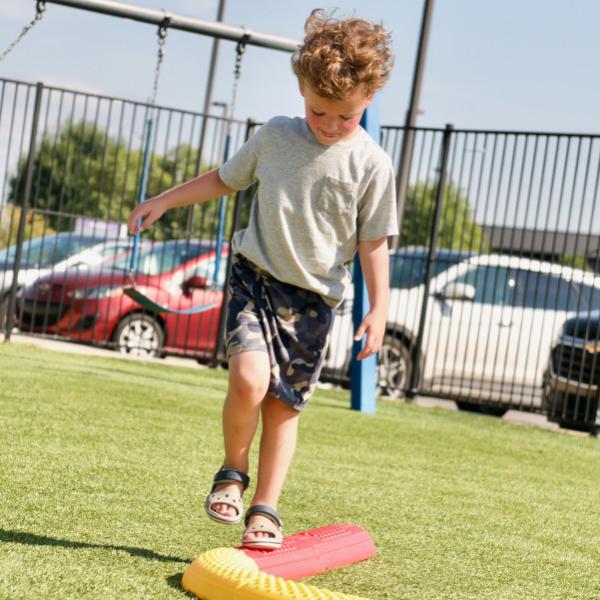 Child practicing balancing