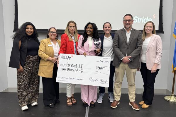 Jada Doyle poses with the judges after placing first in the 2026 Pitch Night competition